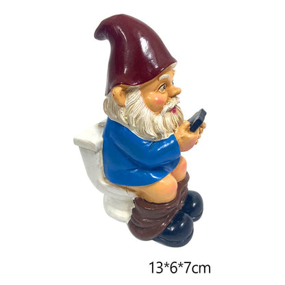 Nain de jardin Original aux toilettes